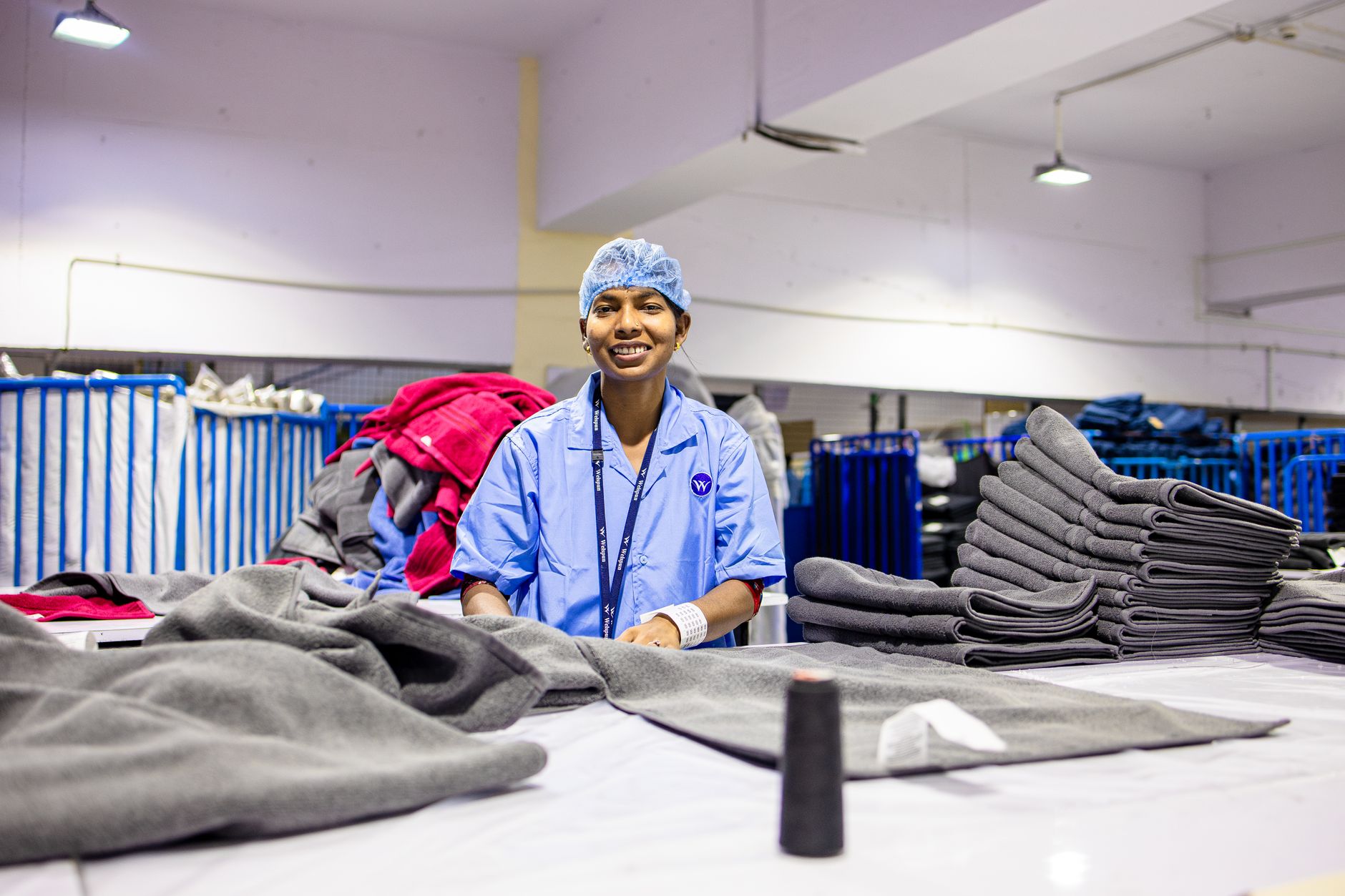 A collaborative robot arm working alongside a human operator on a manufacturing assembly line