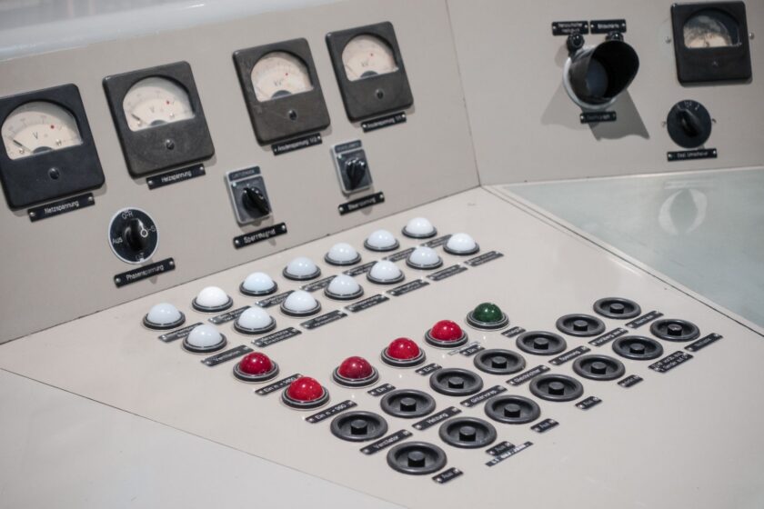 Industrial power meter and control panel on a factory floor