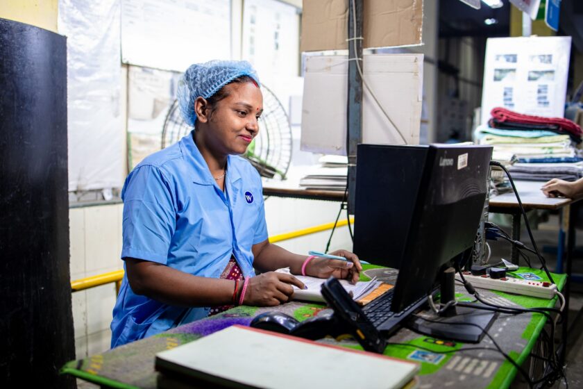 Manufacturing engineer reviewing lot genealogy and traceability data on a plant floor screen