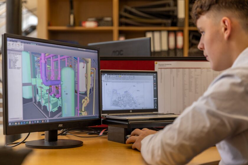 Factory floor operator viewing a modular software marketplace interface on a tablet