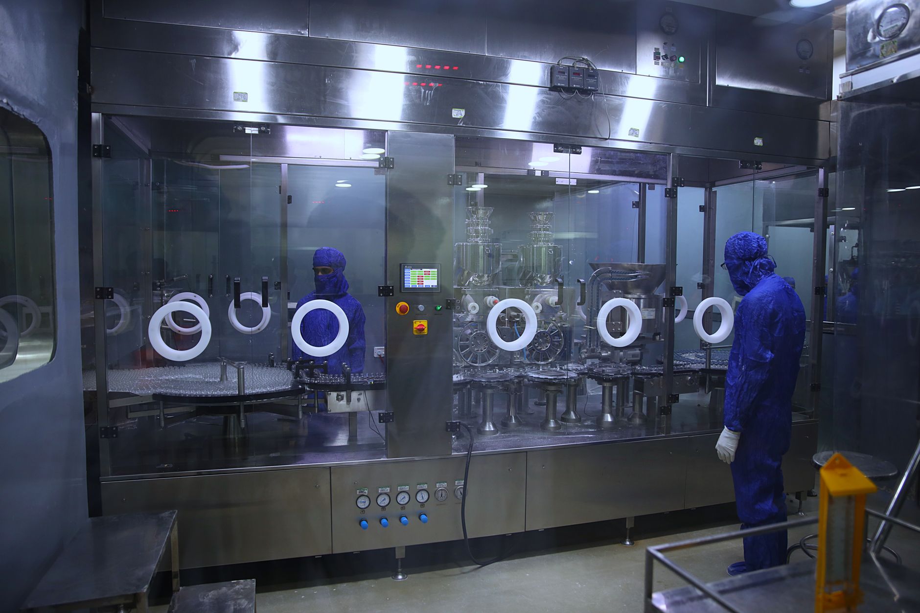 Operator reviewing electronic batch records on a screen in a regulated manufacturing environment
