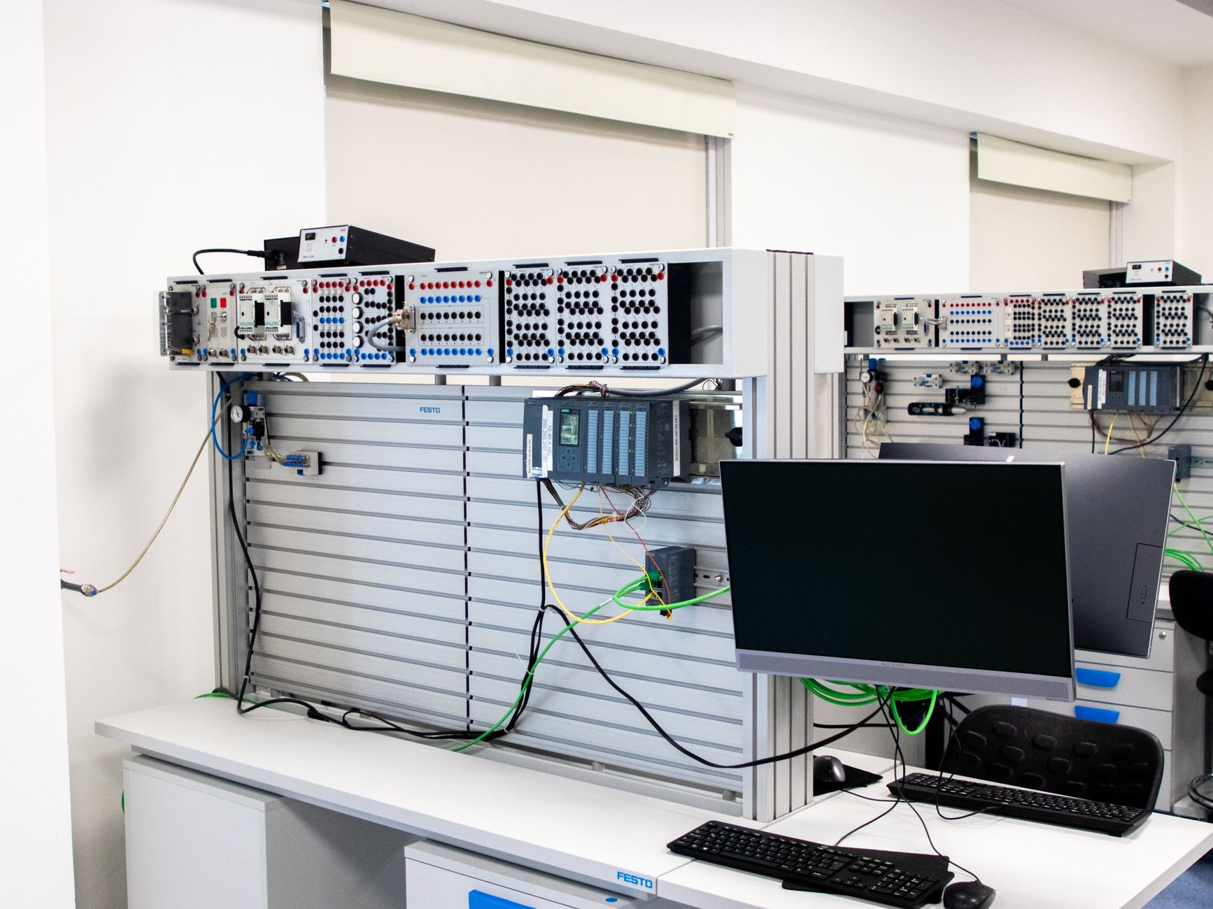 Server racks in an industrial control room representing OT backup and recovery infrastructure