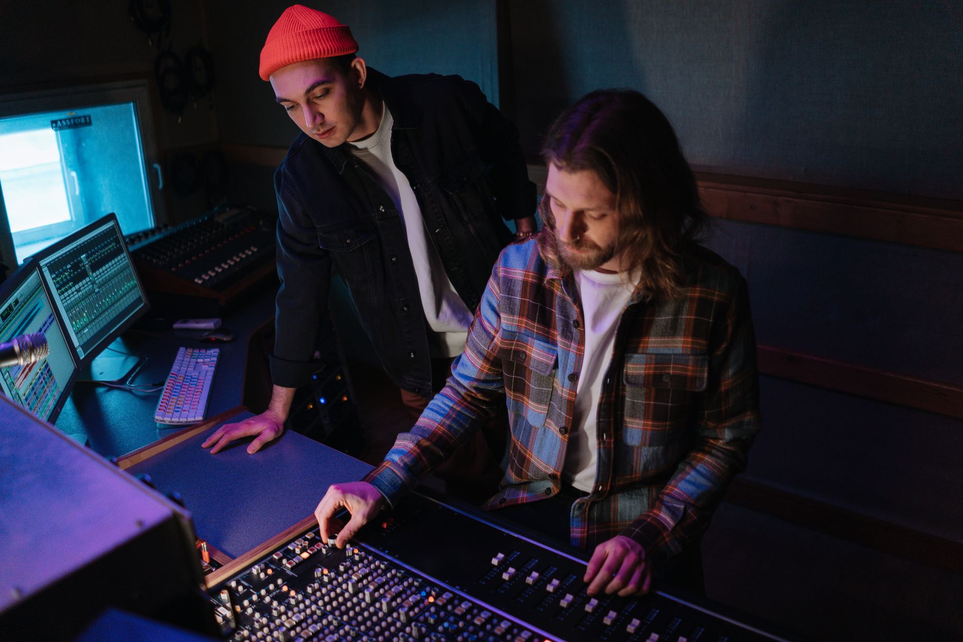 Plant engineer reviewing a cybersecurity advisory on a control room monitor