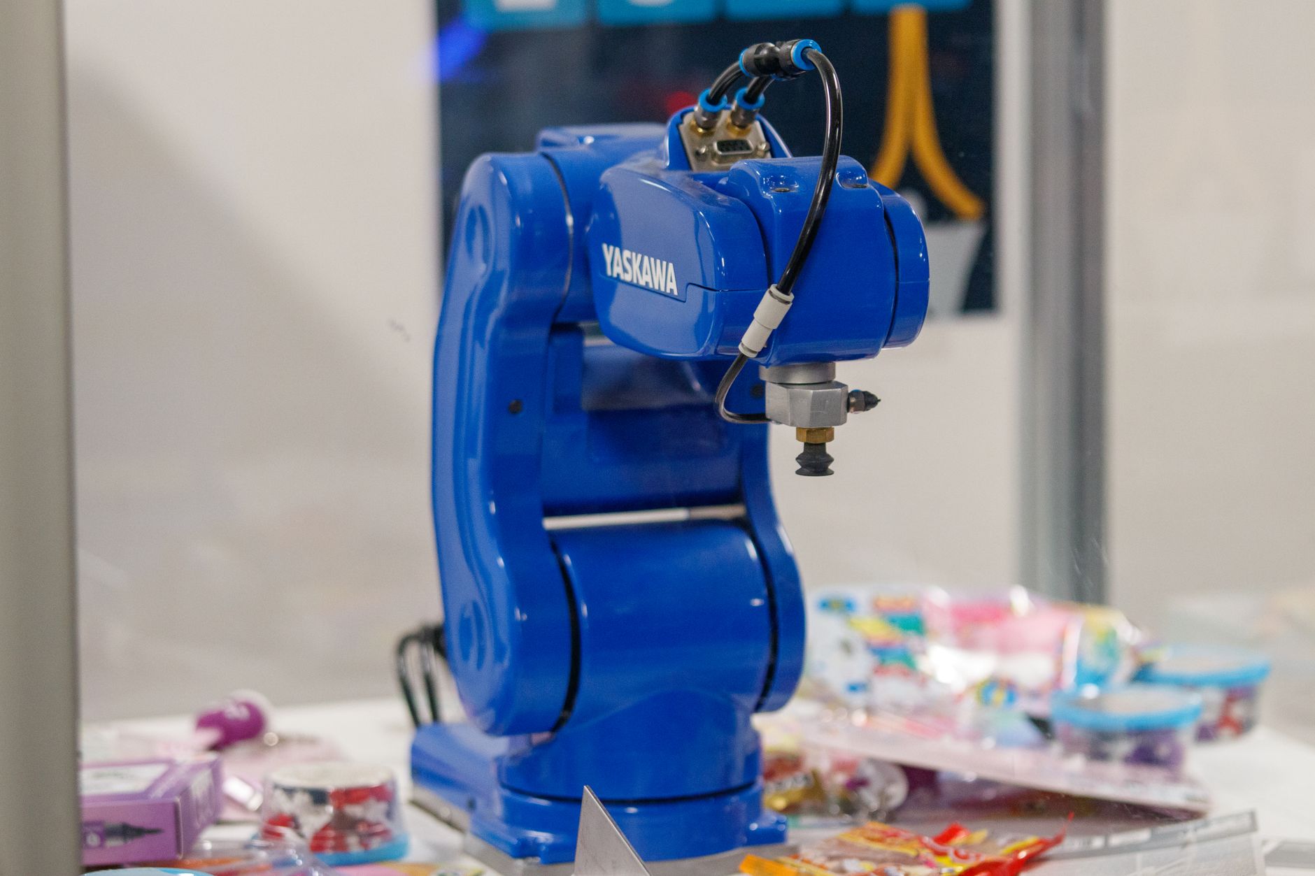 A high-payload collaborative robot arm mounted in a manufacturing cell without perimeter guarding