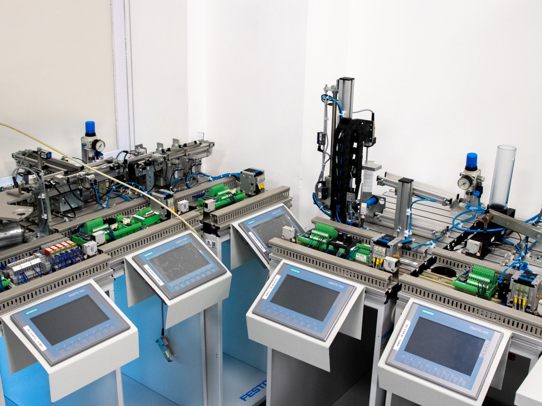 Industrial control cabinet with PLC and HMI representing PackML state machine integration