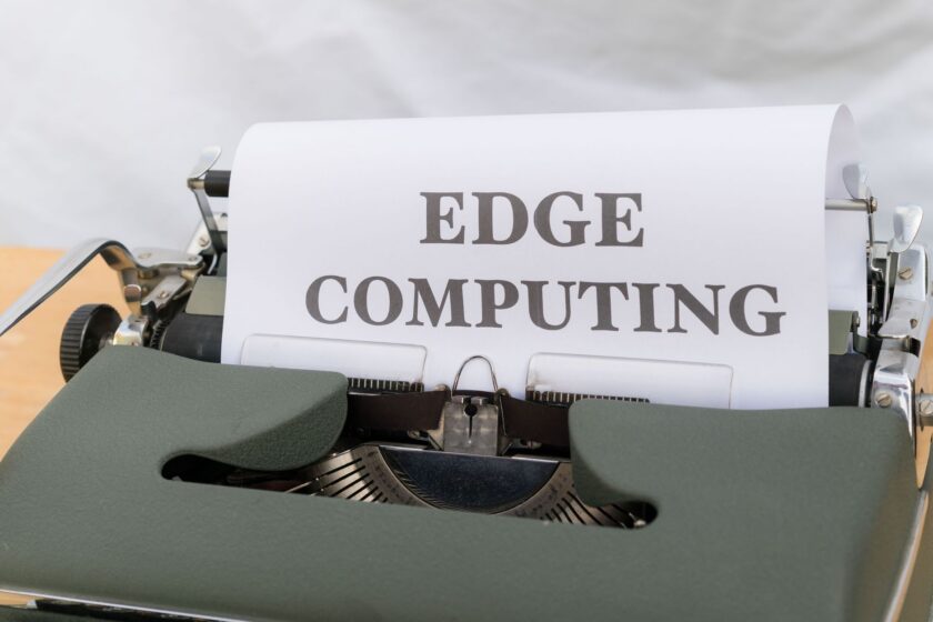 Compact edge computing appliance mounted in an industrial control cabinet on a factory floor