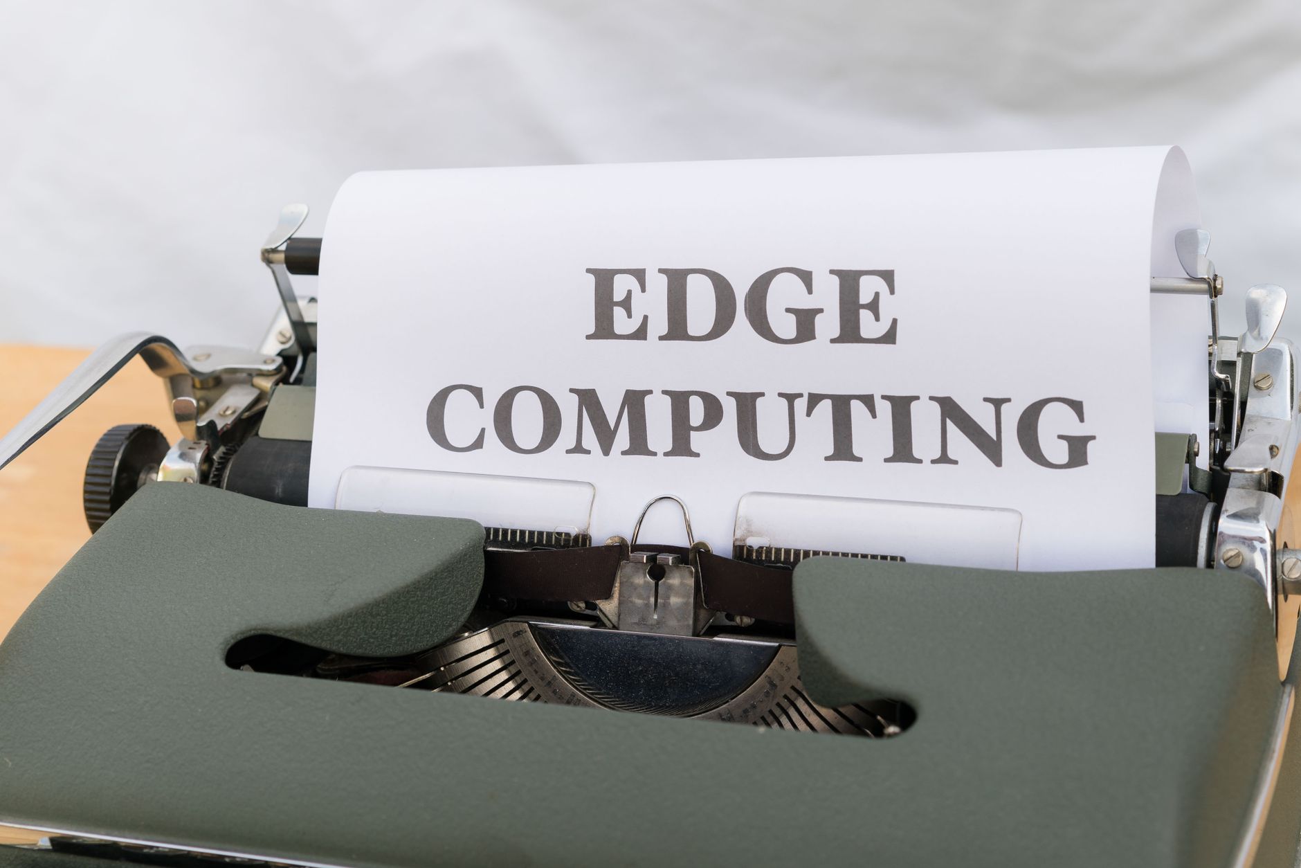 Compact edge computing appliance mounted in an industrial control cabinet on a factory floor