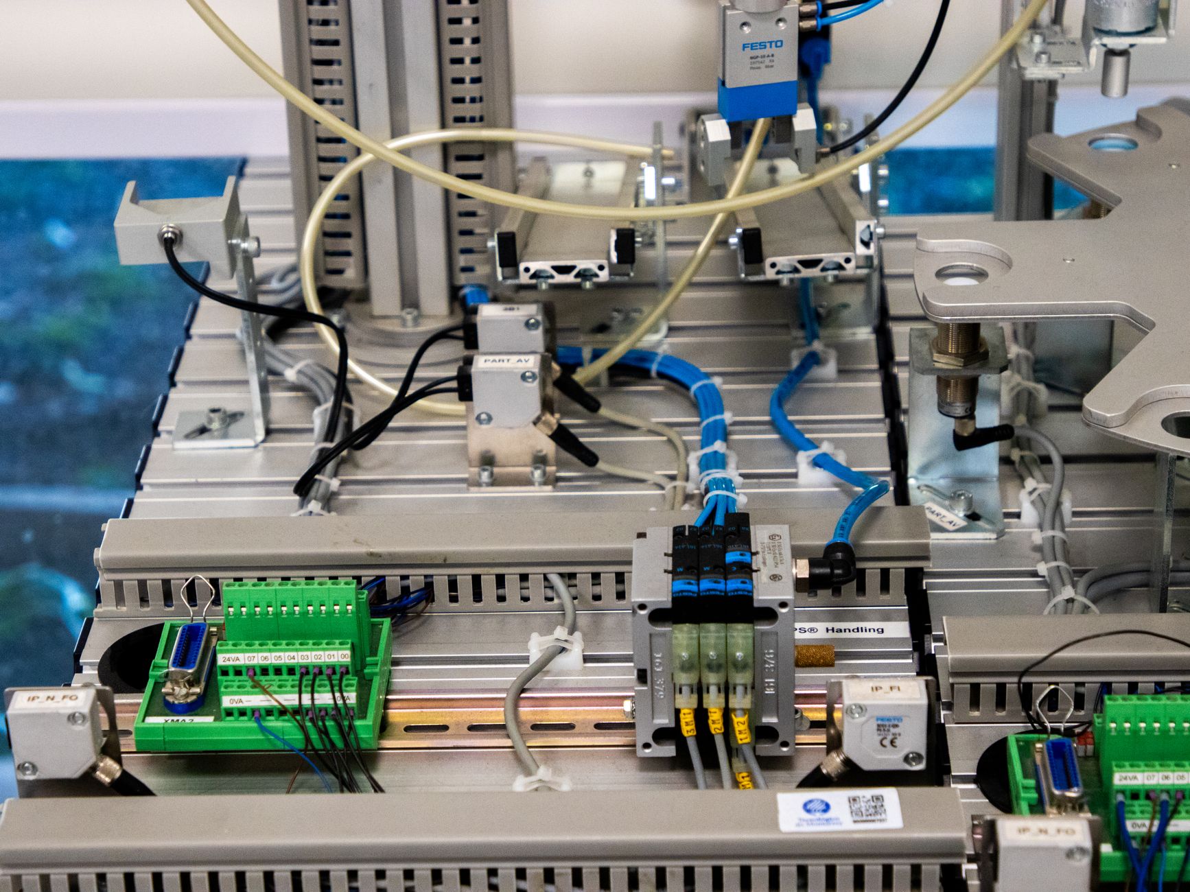 Industrial edge gateway hardware on a factory floor with network cabling